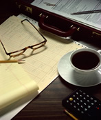 Business Sense @ The Business Centre Llansamlet picture of desk with papers and glasses